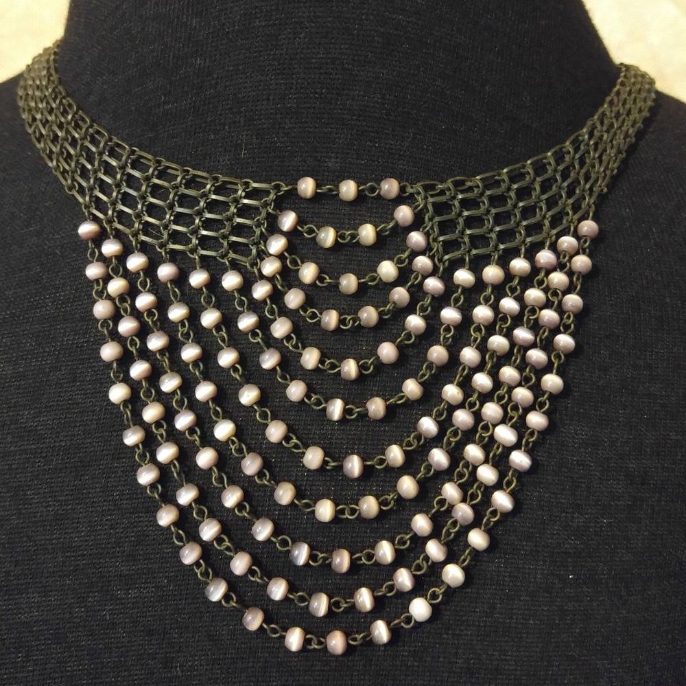 Drop choker necklace with purple cats eyes stones